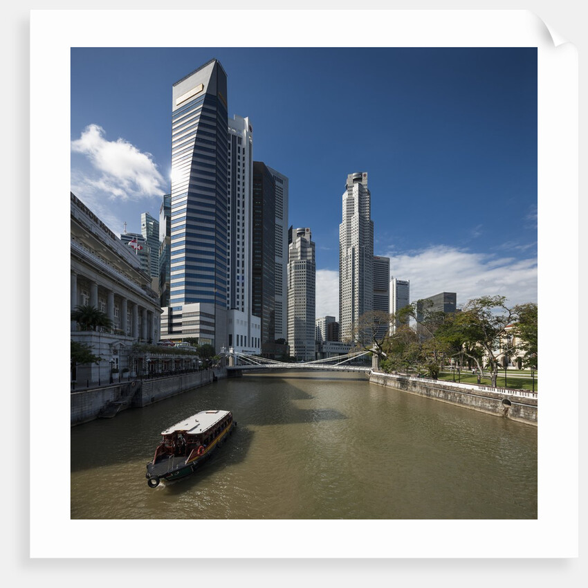 Boat on the Singapore river, the Cavenagh Bridge and the downtown by Anonymous