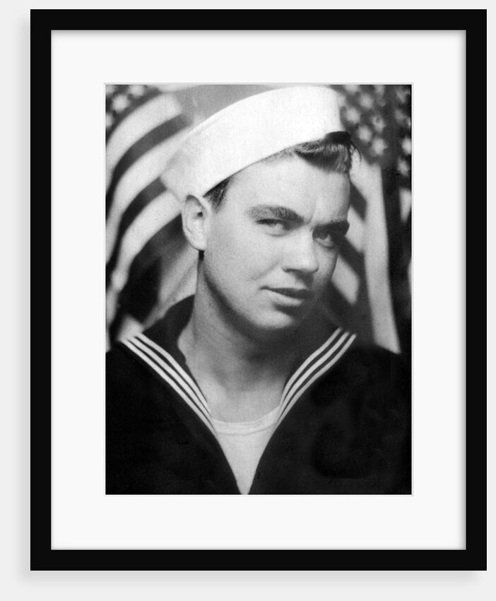 Photo booth portrait of WWII sailor, ca. 1943. by Anonymous