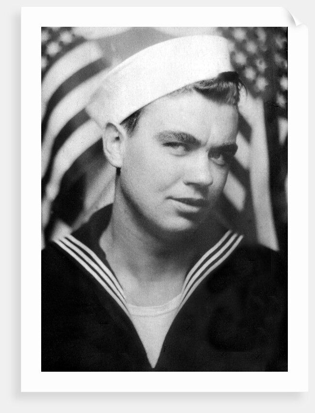 Photo booth portrait of WWII sailor, ca. 1943. by Anonymous