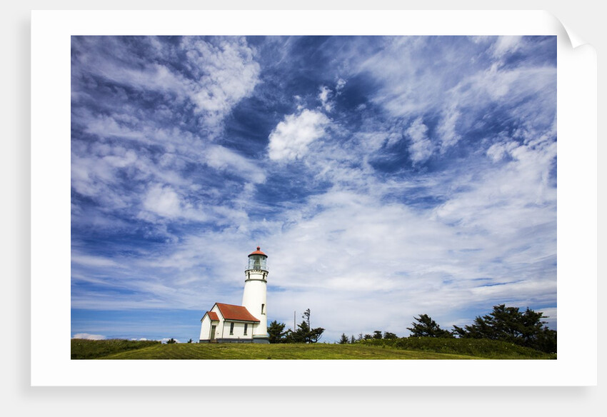 Cape Blanco Lighthouse on the Oregon Coastline with clouds by Anonymous