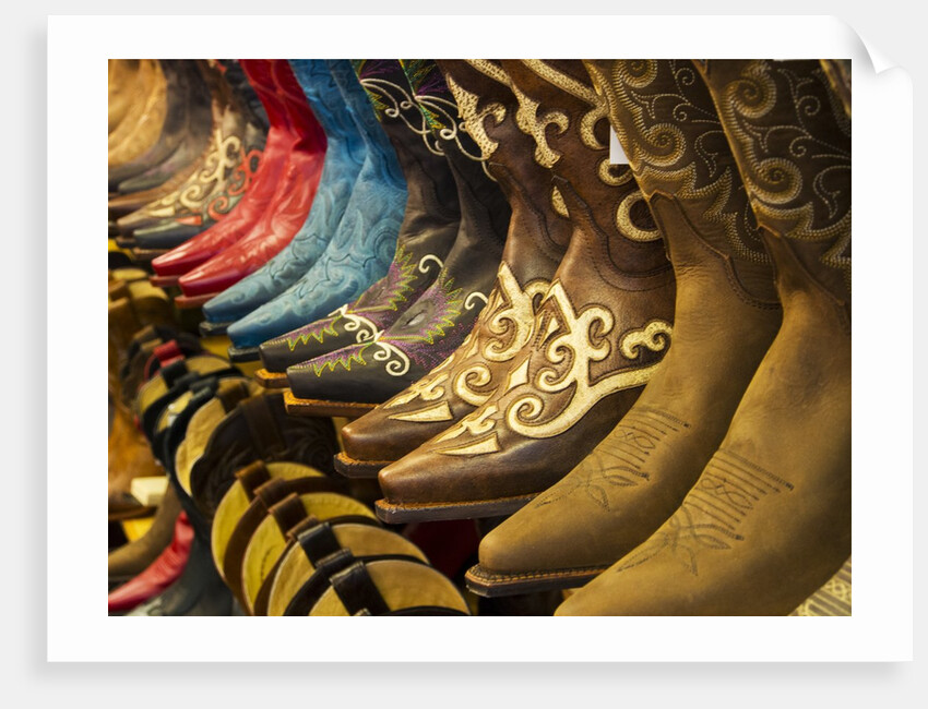 Line up of new cowboy boots in Old Scottsdale by Anonymous