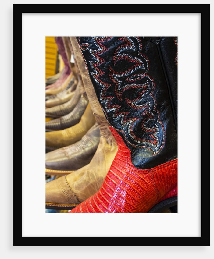 Line up of new cowboy boots in Old Scottsdale by Anonymous