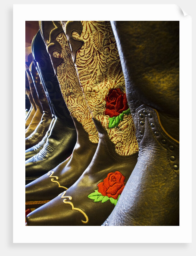 Line up of new cowboy boots in Old Scottsdale by Anonymous