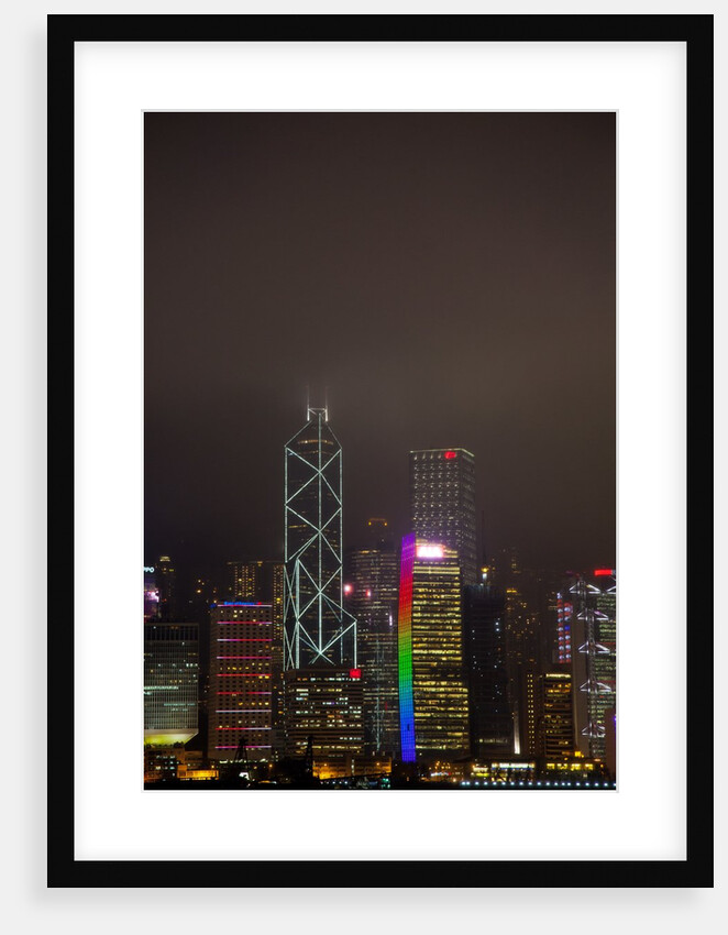 Nightly Light Show of The City of Hong Kong Draped in Fog by Anonymous