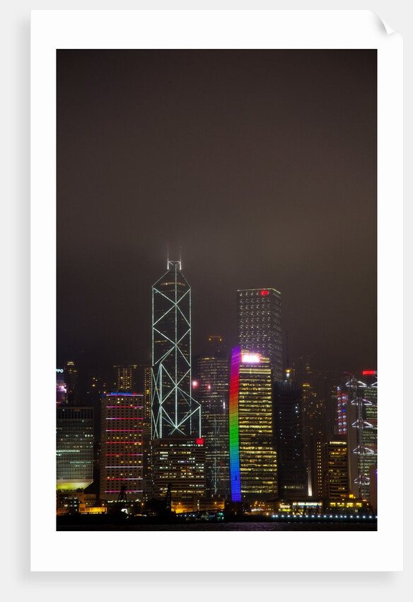 Nightly Light Show of The City of Hong Kong Draped in Fog by Anonymous