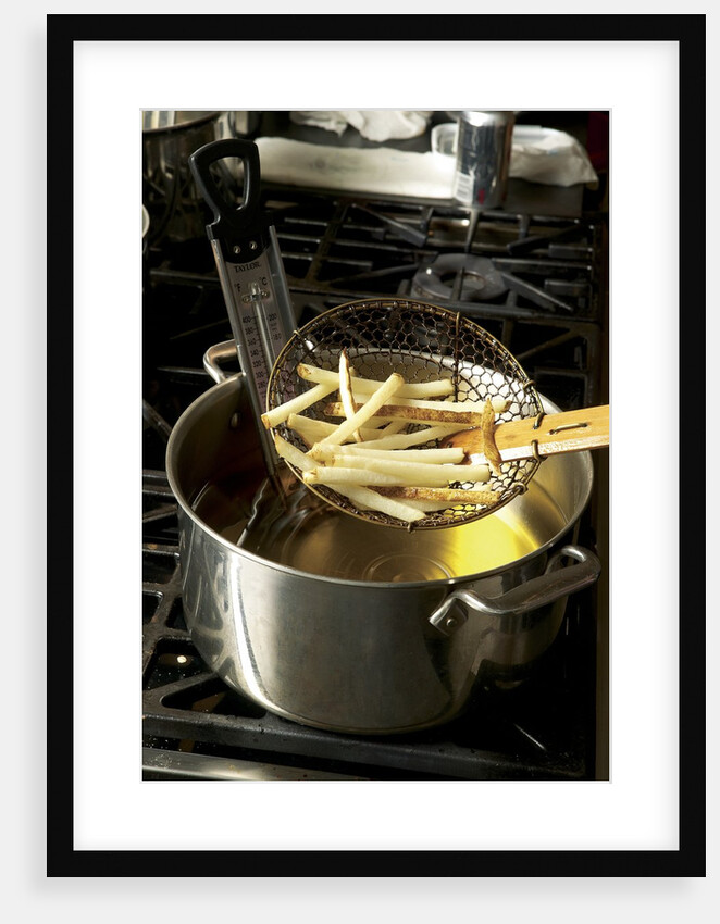 French fries in oil by Anonymous
