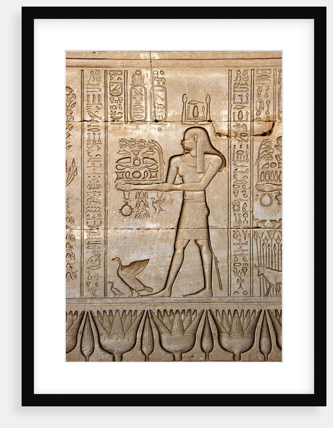 Ancient Egyptian sunken relief depicting man carrying offerings to the goddess Hathor by Anonymous