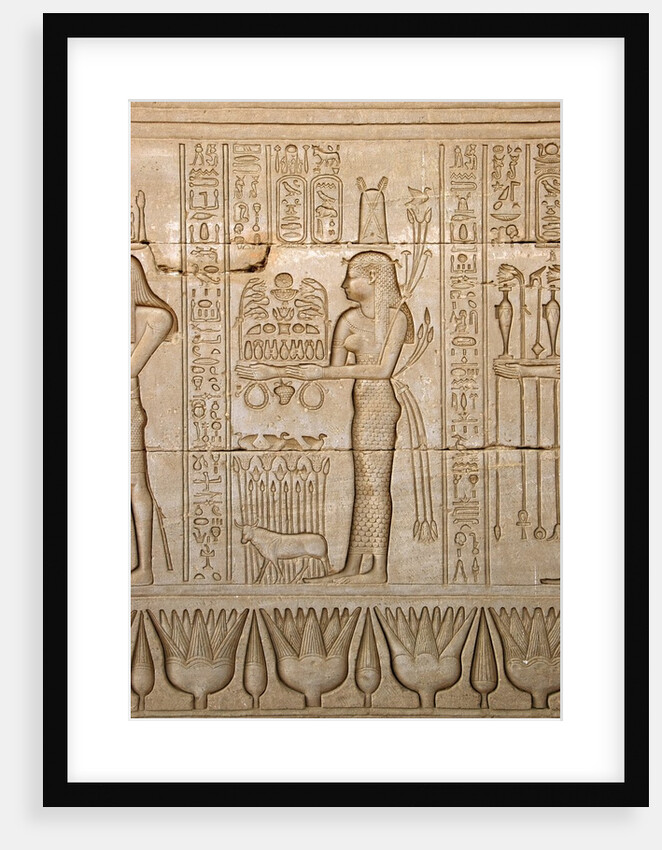 Ancient Egyptian sunken relief depicting woman bringing offerings to the goddess Hathor by Anonymous