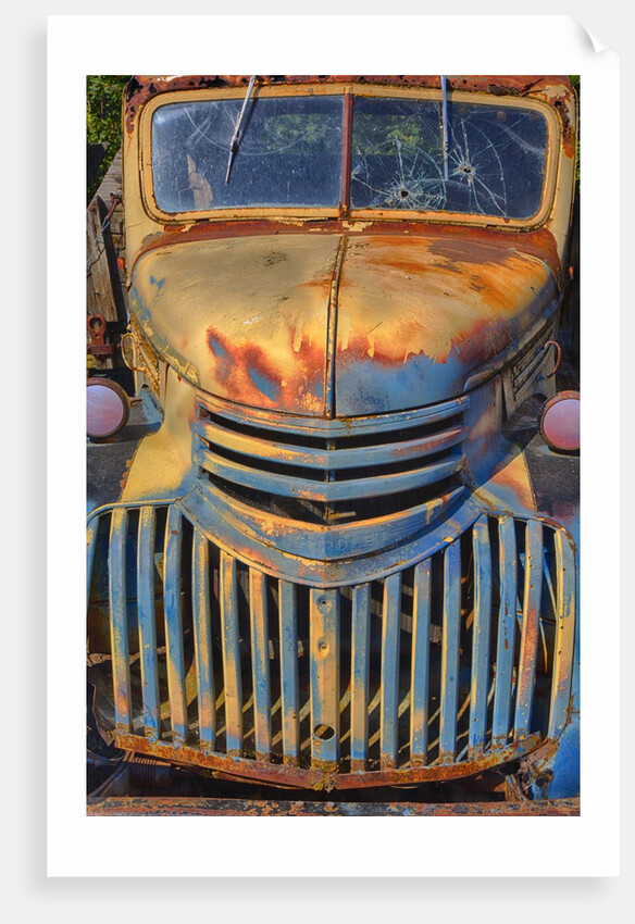 Old Chevy with rust and Fading Paint by Anonymous