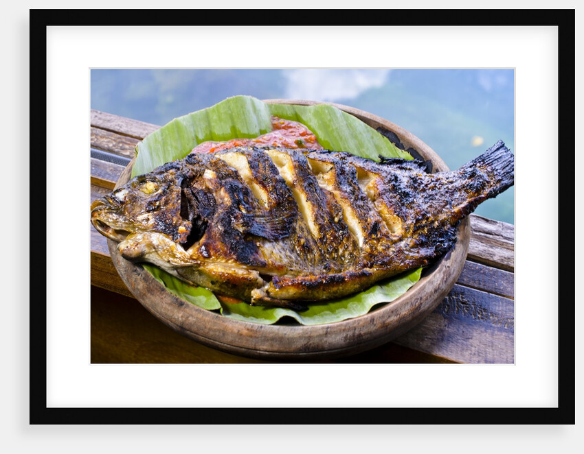 Grilled nila fish, served with banana leave by Anonymous