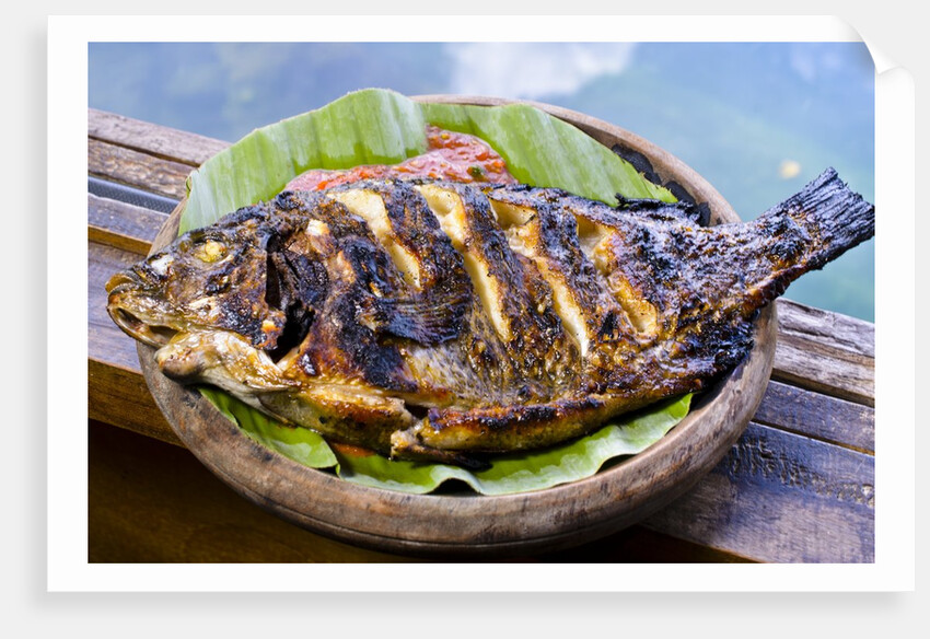 Grilled nila fish, served with banana leave by Anonymous