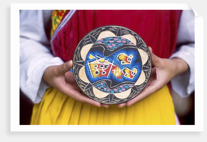 Woman holding wooden plate, China by Anonymous