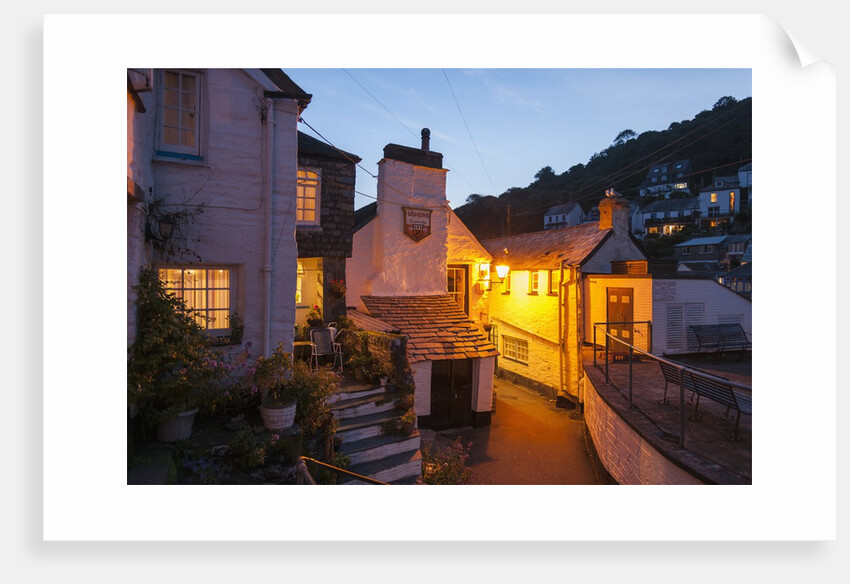 Polperro is a village with beautiful ancient houses along a canal by Anonymous