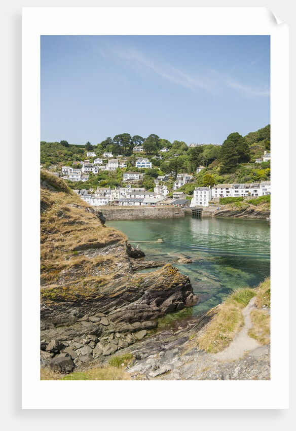 Polperro is a village with beautiful ancient houses along a canal by Anonymous