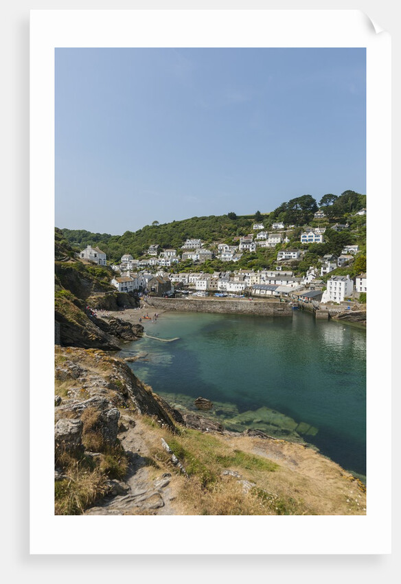 Polperro is a village with beautiful ancient houses along a canal by Anonymous