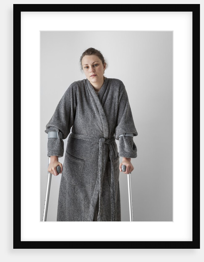 Woman on crutches by Anonymous