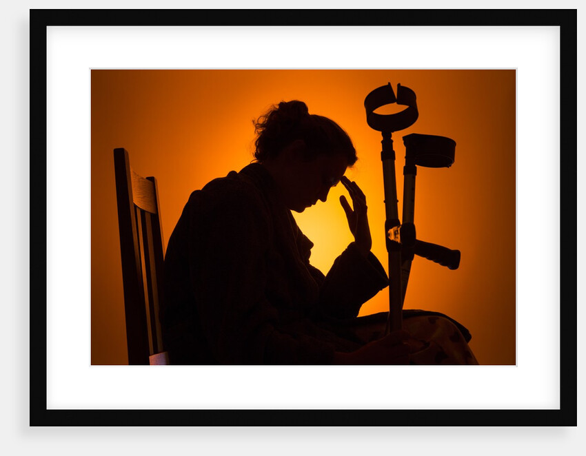 Woman seated with crutches by Anonymous