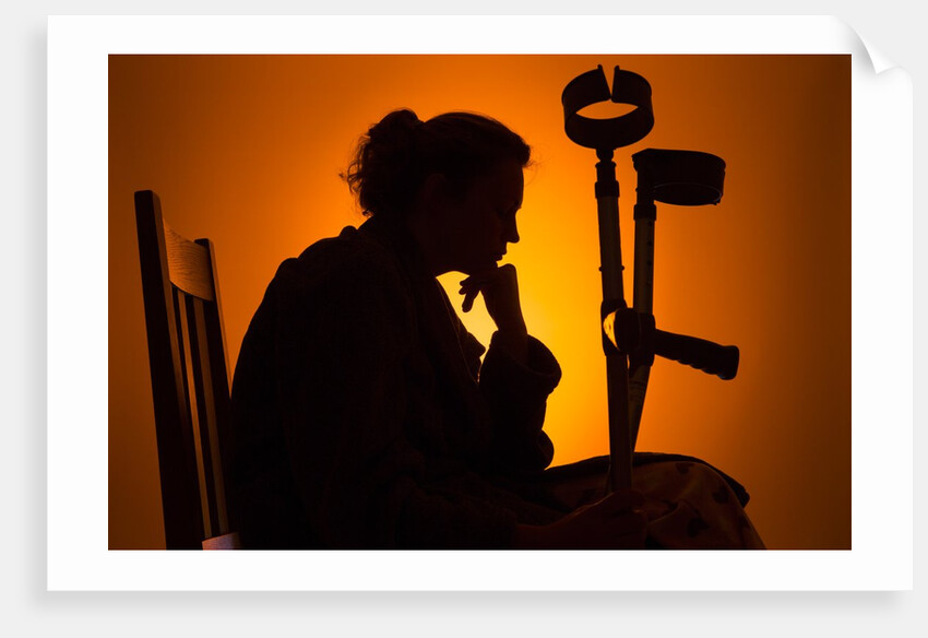 Woman seated with crutches by Anonymous
