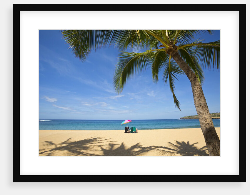 Vacationing couple's beach chair and umbrella on Hulupo'e Beach; Manele Bay; Lanai; Hawaii by Anonymous
