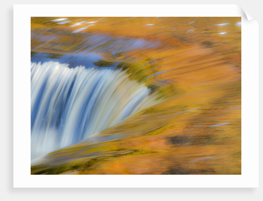 Trees reflect in cascade above Bond Falls on the Middle Fork of the Ontonagon river near Paulding in by Anonymous