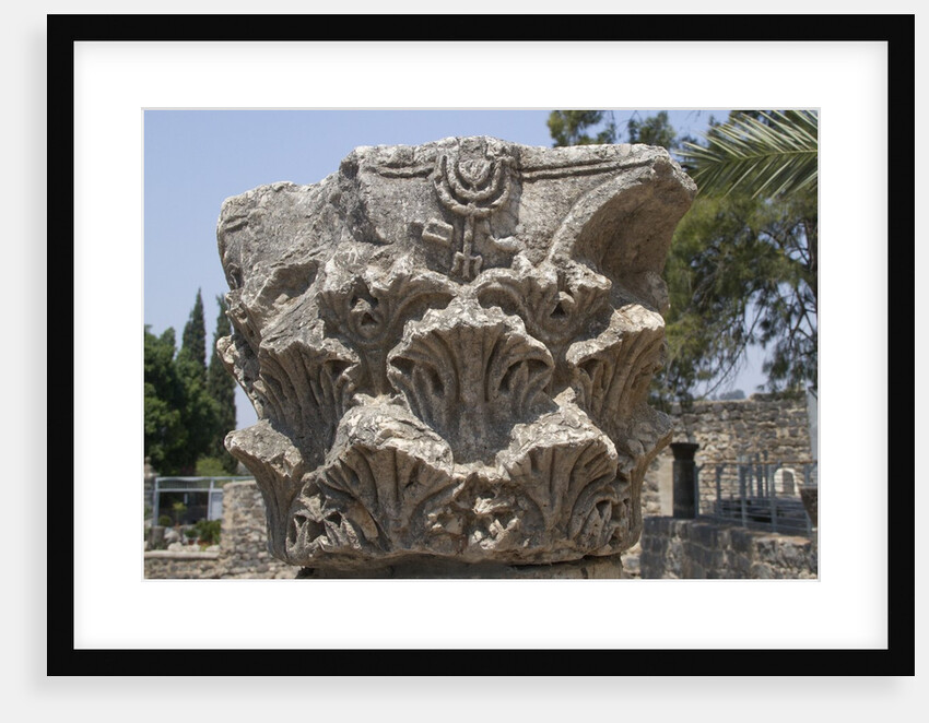 Hebrew menorah carved into stone capital in Roman town of Capernaum by Anonymous