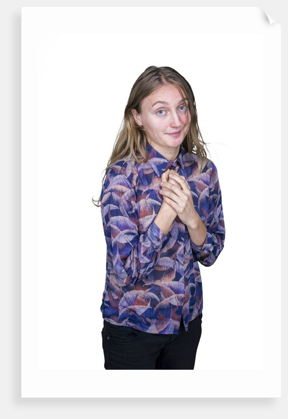 Portrait of teenage girl (16-17) on white background by Anonymous
