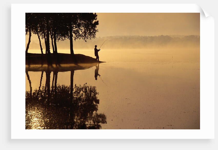 Man Fishing at Lake by Anonymous