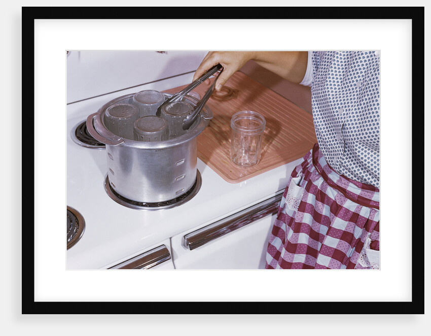 Woman Sterilizing Jars for Canning by Anonymous