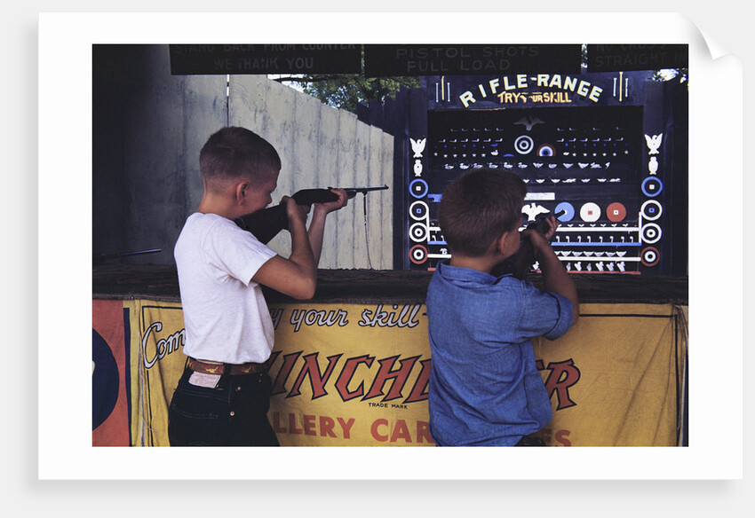 Children Firing Air Rifles at Fair Booth by Anonymous
