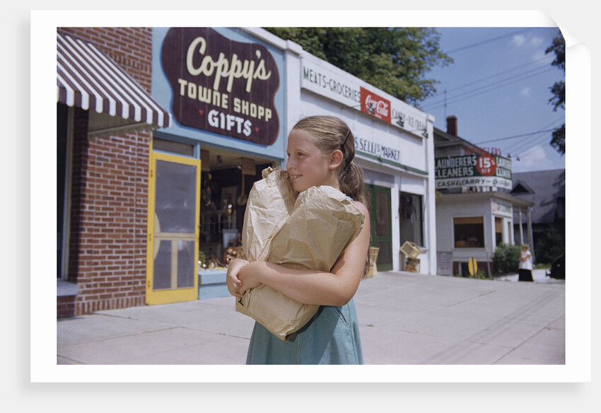 Girl Carrying Paper Shopping Bags by Anonymous