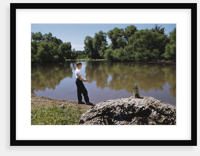 Boy Fishing with Stick and Can of Worms by Anonymous