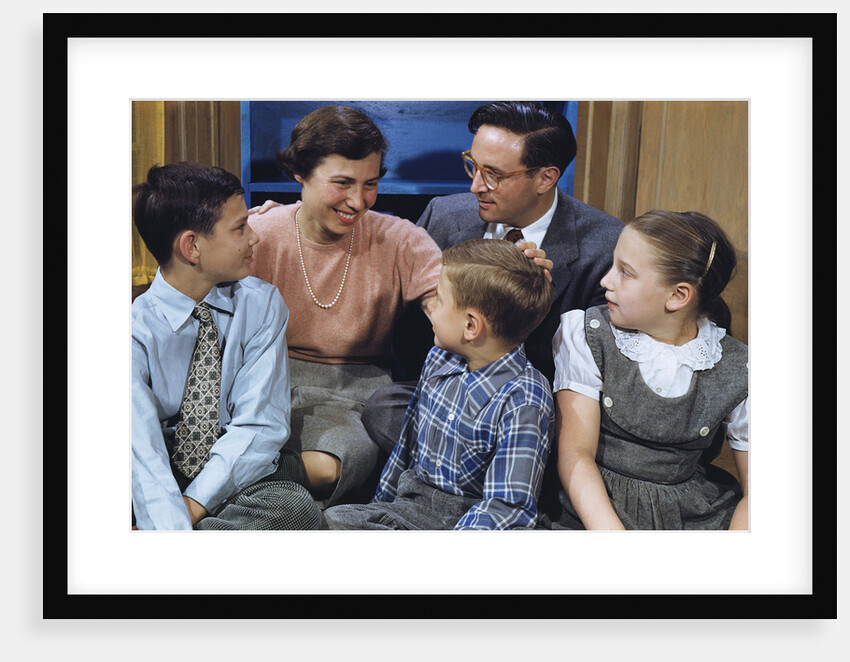 Happy Family Gathered Together at Home by Anonymous
