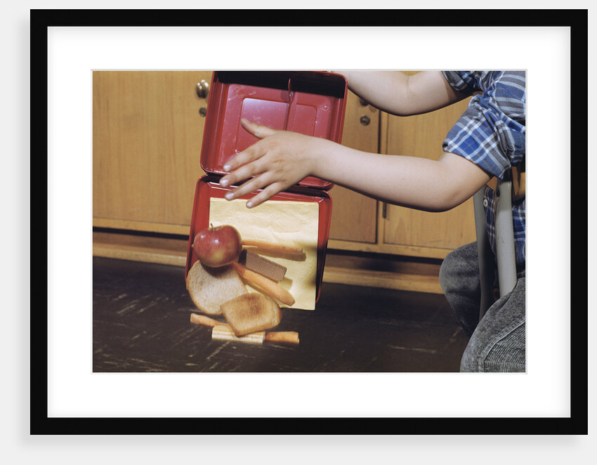 Boy Spilling Lunchbox Contents by Anonymous