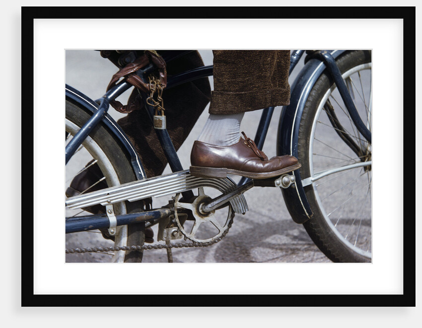 Man Riding Bicycle in Dress Shoes by Anonymous