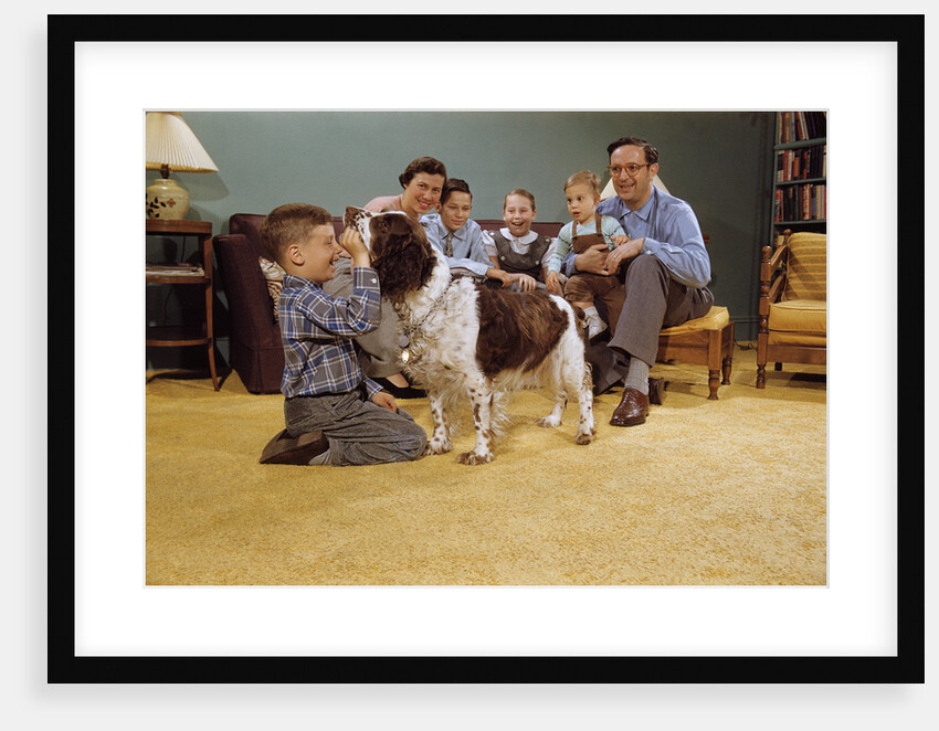 Boy Playing with the Family Dog by Anonymous