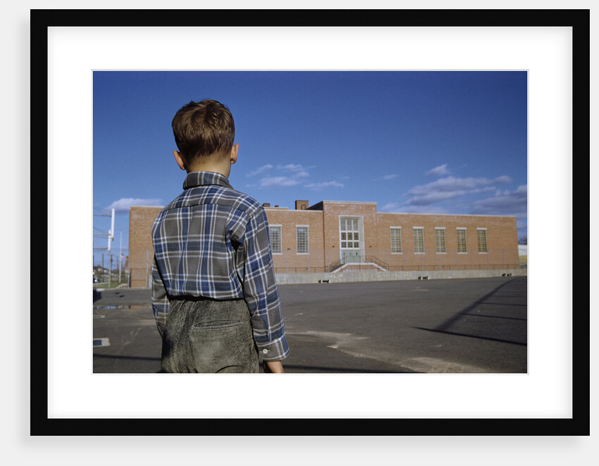 Boy Standing in Schoolyard by Anonymous