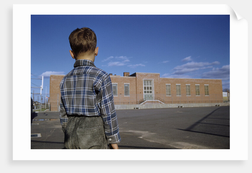 Boy Standing in Schoolyard by Anonymous