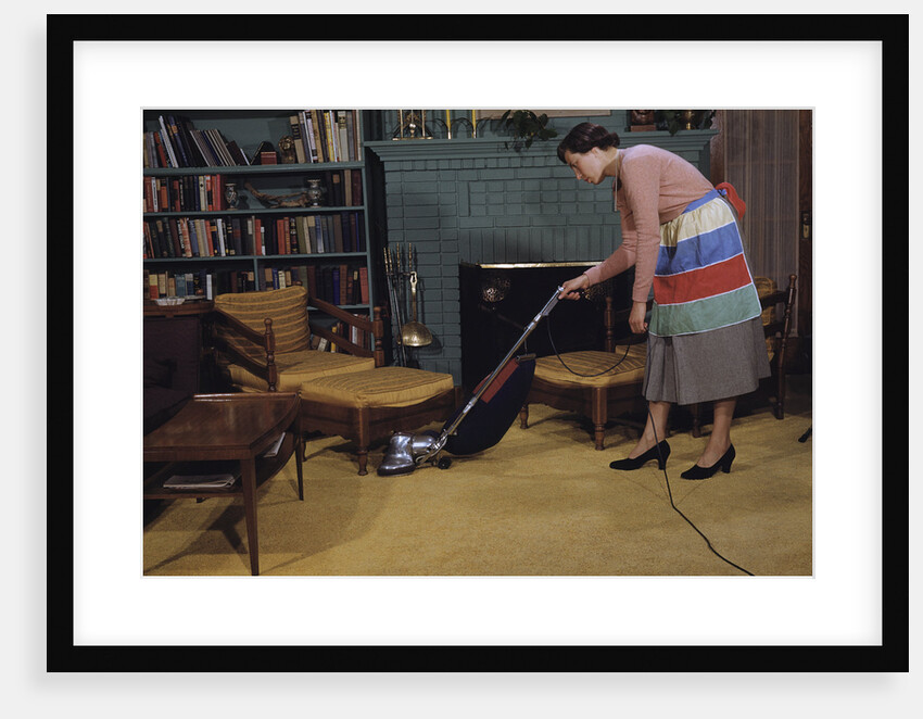 Woman Vacuuming Living Room by Anonymous