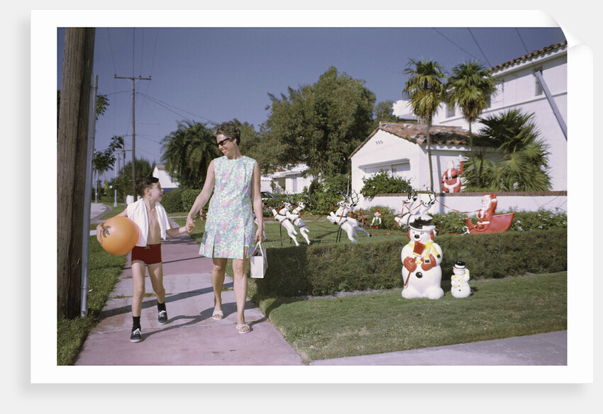 Mother and Son Walking by Christmas Decorations on Yards by Anonymous
