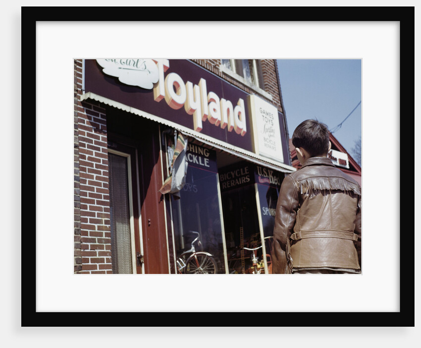 Boy Windowshopping at Toyland by Anonymous