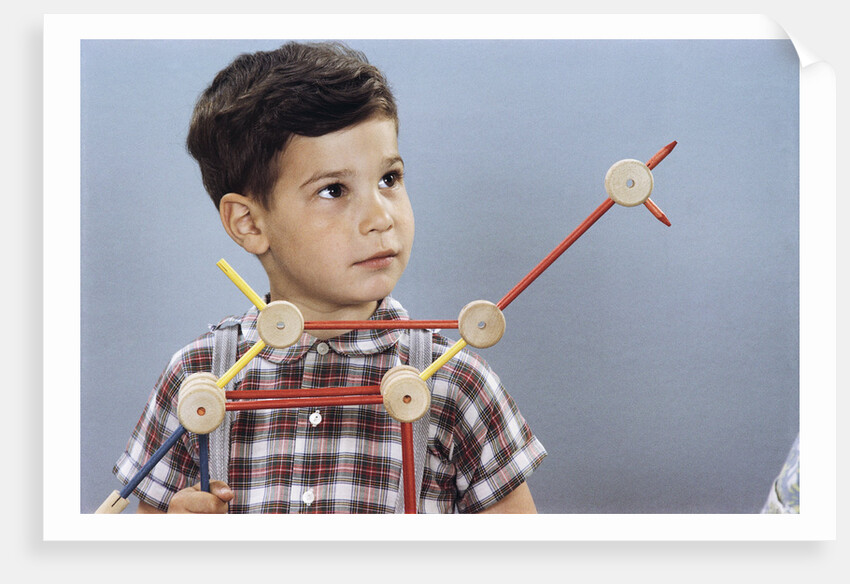 Boy Playing with Tinkertoys (TM) by Anonymous