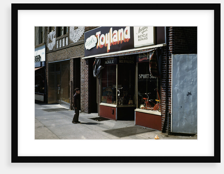 Boy Standing Outside Toyland by Anonymous