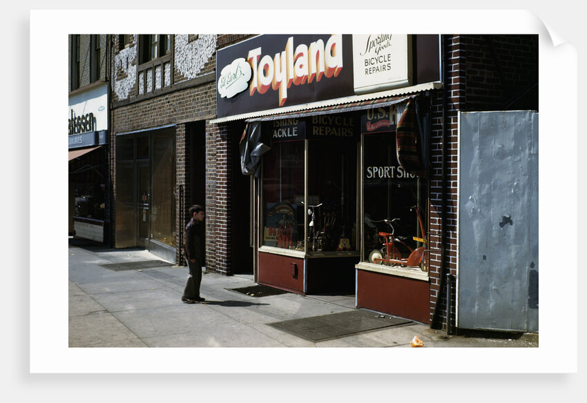 Boy Standing Outside Toyland by Anonymous