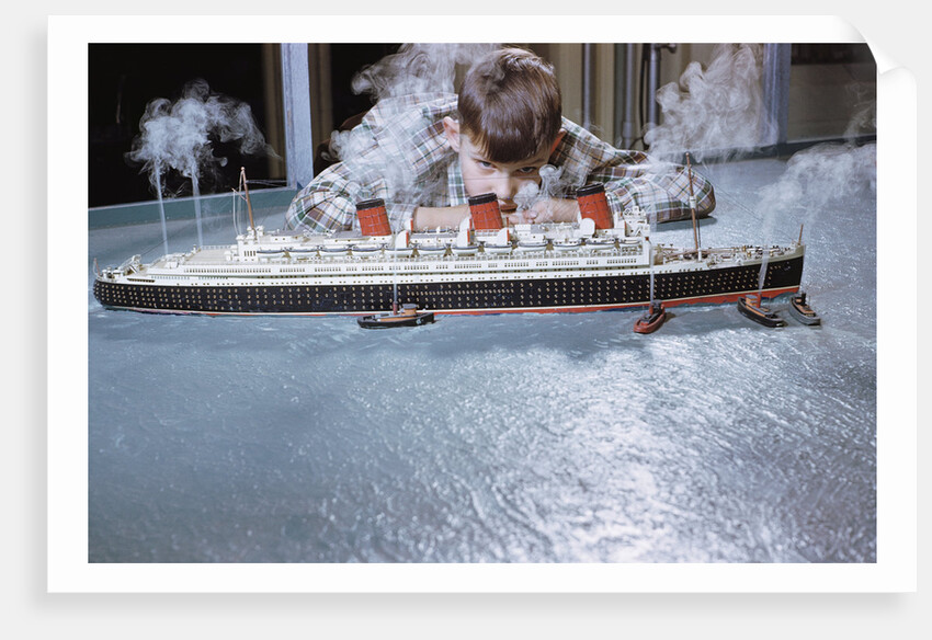 Boy Playing with Toy Ocean Liner by Anonymous