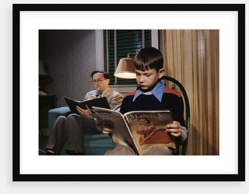 Father and Son Reading at Home by Anonymous
