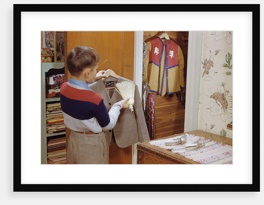 Boy Brushing His Suit Jacket by Anonymous