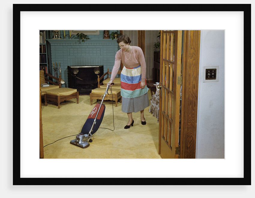 Woman Vacuuming Living Room by Anonymous