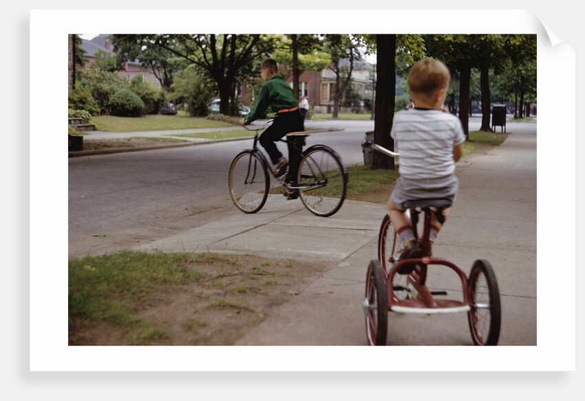 Boys Riding Their Bike and Tricycle by Anonymous