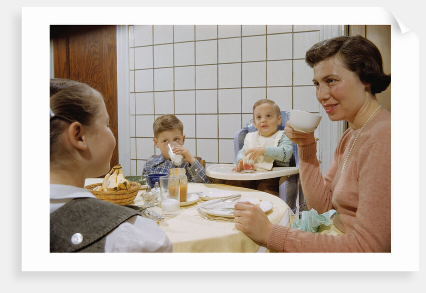 Mother and Daughter Conversing at Dinner Table by Anonymous