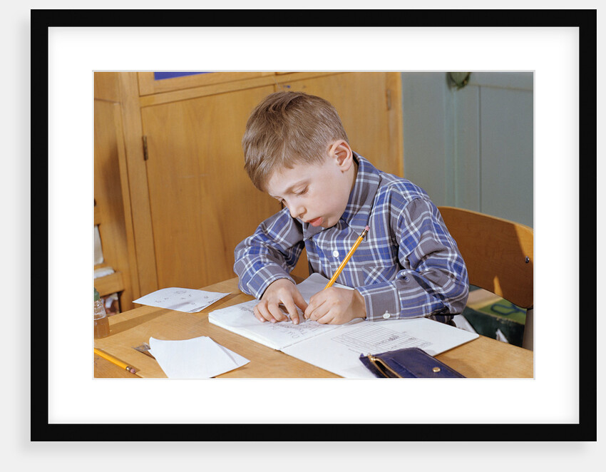 Boy Working on His Schoolwork by Anonymous